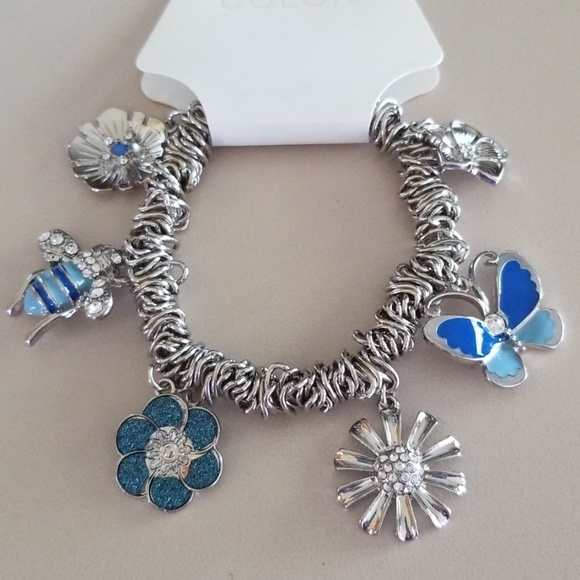 ❄️   ⬇️  SILVERTONE FLOWERS & BUTTERFLY BRACELET - Picture 2 of 2